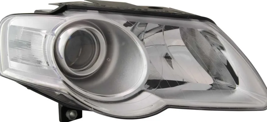 Strålkastare Vänster VW Passat 3C